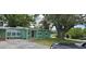 Charming single-story home featuring a well-maintained lawn and mature trees at 1615 Stevensons Dr, Clearwater, FL 33755