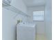 Laundry room featuring a washer and dryer at 1632 Gray Bark Dr, Oldsmar, FL 34677