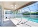 Screened-in pool area with brick patio at 1632 Gray Bark Dr, Oldsmar, FL 34677