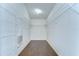 Walk-in closet featuring shelving for plenty of storage at 1632 Gray Bark Dr, Oldsmar, FL 34677