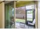 Covered and screened patio space with outdoor seating, perfect for relaxing or entertaining at 20224 Pond Apple Ln, Tampa, FL 33647