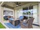 Covered patio area with comfortable seating and a cozy outdoor ambiance at 2800 Flagler Ct, Trinity, FL 34655