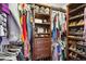 Ample shelving and clothing racks maximize storage in this well-organized walk-in closet at 2800 Flagler Ct, Trinity, FL 34655