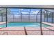 A serene private pool area perfect for relaxation and outdoor enjoyment at 2927 Hickory Grove Dr, Valrico, FL 33596