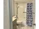 Bathroom featuring shower and tub combination, a sink with vanity and tiled floors at 3025 Bonaventure Cir # 103, Palm Harbor, FL 34684
