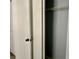 The open closet has ample storage space and a shelf at 3025 Bonaventure Cir # 103, Palm Harbor, FL 34684