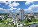 Captivating aerial view of the city showcasing modern high-rise buildings, parks, and waterfront views, offering an urban oasis at 331 Cleveland St # 320, Clearwater, FL 33755