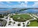 Expansive aerial view capturing a park and surrounding waterfront, showcasing scenic beauty at 331 Cleveland St # 320, Clearwater, FL 33755
