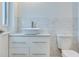 Stylish bathroom featuring a modern vessel sink, sleek vanity, and elegant marble-look tile at 331 Cleveland St # 320, Clearwater, FL 33755