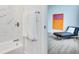 Bathroom with tub and shower combination adjacent to bedroom at 331 Cleveland St # 320, Clearwater, FL 33755