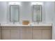 Bathroom vanity with dual sinks, quartz counters, and modern fixtures at 331 Cleveland St # 320, Clearwater, FL 33755