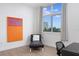 Bedroom featuring a large window with exterior views at 331 Cleveland St # 320, Clearwater, FL 33755