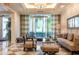Well-appointed lobby featuring modern seating arrangements, a water feature, and stylish decor at 331 Cleveland St # 320, Clearwater, FL 33755