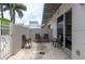 Charming patio featuring comfortable seating and views of lush landscaping at 331 Cleveland St # 320, Clearwater, FL 33755