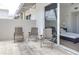 Inviting patio with seating area and sliding door access to the main bedroom at 331 Cleveland St # 320, Clearwater, FL 33755