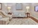 Relaxing sitting area with plush seating, complemented by stylish lamps and a decorative rug at 331 Cleveland St # 320, Clearwater, FL 33755