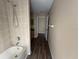 Bright bathroom featuring a shower and updated vanity at 3355 Abeline Rd, Spring Hill, FL 34608