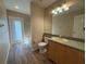 A bathroom showing vanity with large mirror and a shower/tub combo at 3355 Abeline Rd, Spring Hill, FL 34608