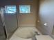 Bathroom featuring a glass-enclosed shower and large soaking tub at 3355 Abeline Rd, Spring Hill, FL 34608