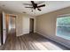 Spacious bedroom features a closet and hardwood floors at 3355 Abeline Rd, Spring Hill, FL 34608