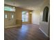 Bright foyer with tile entry, new floors, a large window, and convenient access to the rest of the home at 3355 Abeline Rd, Spring Hill, FL 34608