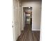 Hallway view of kitchen, showcasing appliances and cabinet space at 3355 Abeline Rd, Spring Hill, FL 34608