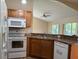 Charming kitchen with modern appliances and ample countertop space at 3355 Abeline Rd, Spring Hill, FL 34608