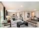 Bright open-concept living room and kitchen with modern decor and plenty of natural light at 37213 Sagemoor Dr, Zephyrhills, FL 33541