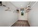 Walk-in closet with carpet and wire shelving for optimal storage and organization at 37213 Sagemoor Dr, Zephyrhills, FL 33541