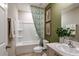 Well-appointed bathroom featuring a shower, tub, and vanity with stylish accents for a spa-like experience at 37230 Sagemoor Dr, Zephyrhills, FL 33541