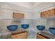 Organized pantry featuring wire shelving, woven baskets, and ample storage space at 37244 Sagemoor Dr, Zephyrhills, FL 33541
