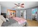 Bedroom with hardwood floors and a vanity area with mirror at 3961 15Th N Ave, St Petersburg, FL 33713