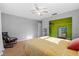 Bedroom with neutral walls, hardwood floors, and a convenient closet at 3961 15Th N Ave, St Petersburg, FL 33713