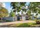 A single-story home featuring a well-kept lawn, an arched entryway, and a one-car garage at 3961 15Th N Ave, St Petersburg, FL 33713