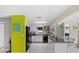 Bright kitchen with white cabinets, black appliances, and an eat-in island at 3961 15Th N Ave, St Petersburg, FL 33713