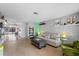 Bright and open living room featuring hardwood floors and modern decor at 3961 15Th N Ave, St Petersburg, FL 33713