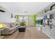 Stylish living room with hardwood floors, modern decor, and ample natural light at 3961 15Th N Ave, St Petersburg, FL 33713