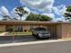 Charming property with parking, vibrant landscaping and a welcoming outdoor space at 4814 Grist Mill Cir, New Port Richey, FL 34655