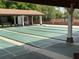 Recreational shuffleboard courts with shaded pavilion and seating at 4814 Grist Mill Cir, New Port Richey, FL 34655