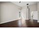 Spacious primary bedroom with high ceilings and wood floors leads to the ensuite bath at 5104 E Longboat Blvd, Tampa, FL 33615