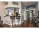 Stylish kitchen featuring a breakfast bar, stainless steel appliances, and plenty of storage space at 632 Lake Cypress Cir, Oldsmar, FL 34677
