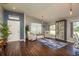 Inviting living room featuring hardwood floors, stylish furniture, and lots of natural light at 632 Lake Cypress Cir, Oldsmar, FL 34677
