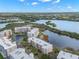 Aerial view of a multi-story condo complex with a waterfront location with a boat dock at 6475 Shoreline Dr # 5403, St Petersburg, FL 33708
