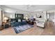 Inviting living room featuring nice flooring, large mirror and comfortable seating and lake views at 6475 Shoreline Dr # 5403, St Petersburg, FL 33708