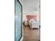 Main bedroom featuring paneled door, neutral decor and a coordinating floral motif bedding set at 6475 Shoreline Dr # 5403, St Petersburg, FL 33708