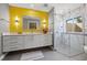 Modern bathroom featuring a glass-enclosed shower, a spacious vanity, and stylish fixtures at 7201 15Th Ne Ct, St Petersburg, FL 33702