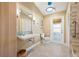 Bright bathroom featuring modern fixtures, stylish lighting, and mosaic tile accents at 7201 15Th Ne Ct, St Petersburg, FL 33702