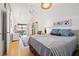 Spacious bedroom with office area, bathed in natural light and stylishly decorated at 7201 15Th Ne Ct, St Petersburg, FL 33702