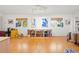 Multi-purpose bonus room with bamboo flooring, bright lighting, and ample space for various activities at 7201 15Th Ne Ct, St Petersburg, FL 33702