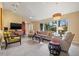 Inviting living area featuring tile floors, neutral decor, and large windows for ample sunlight at 7201 15Th Ne Ct, St Petersburg, FL 33702